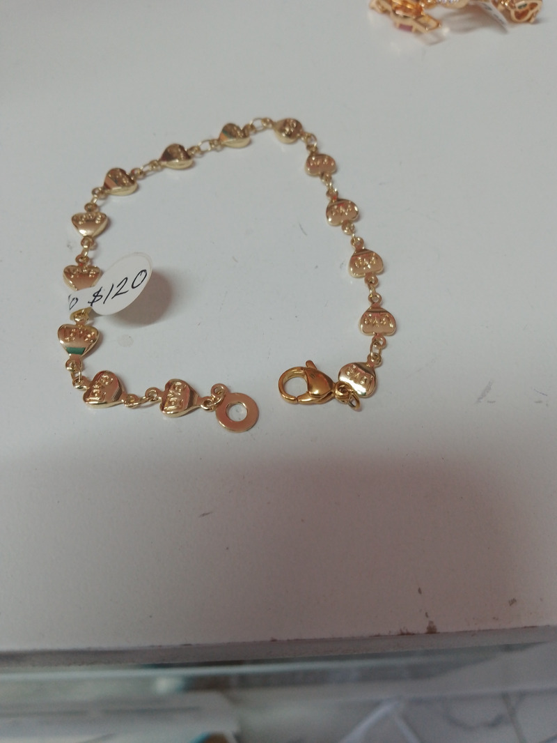 Pulsera corazones oro laminado
